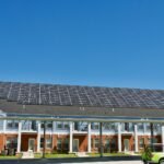 white and blue concrete building under blue sky during daytime