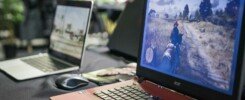 el costo oculto de equipos obsoletos, a couple of laptops sit on a table