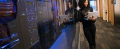 propuesta comercial de tecnología, woman in black top using Surface laptop